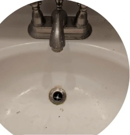 Sink with stains before cleaning