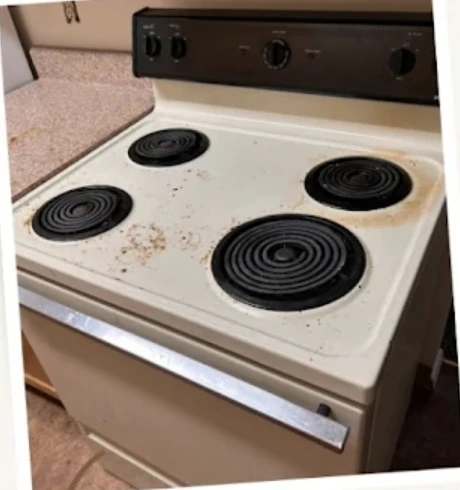 Greasy stove top before cleaning